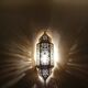 Moroccan brass wall lamp with an antique look