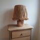 Lampe en pierre et raphia