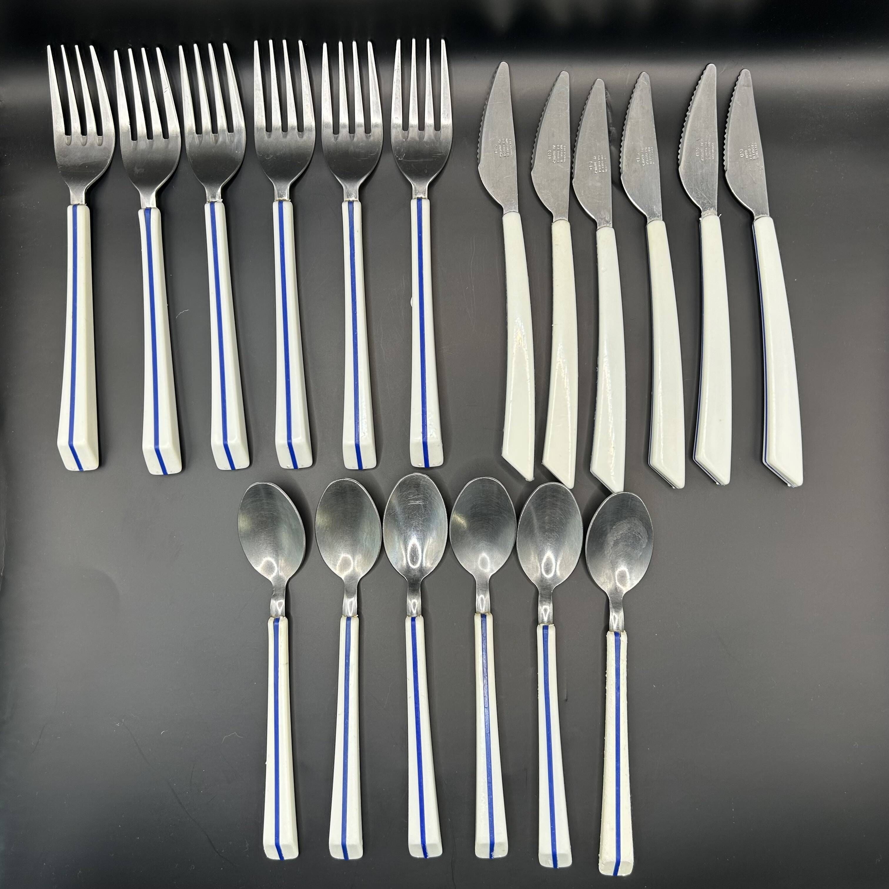 18 Air France place settings by Nathalie George for Guy Degrenne