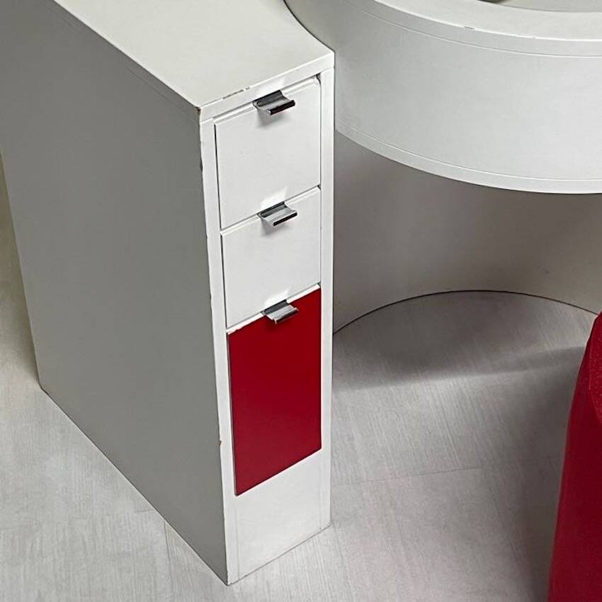 Bathroom toilet with a 70s pouf.