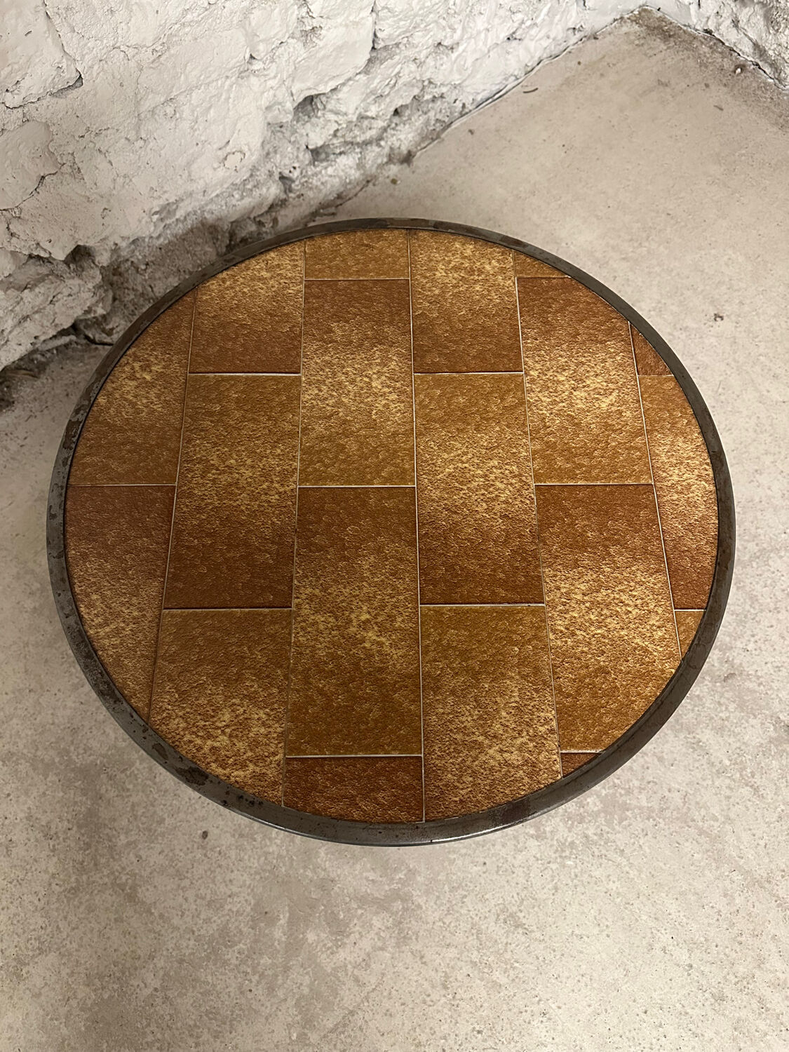 Vintage round ceramic and wrought iron coffee table