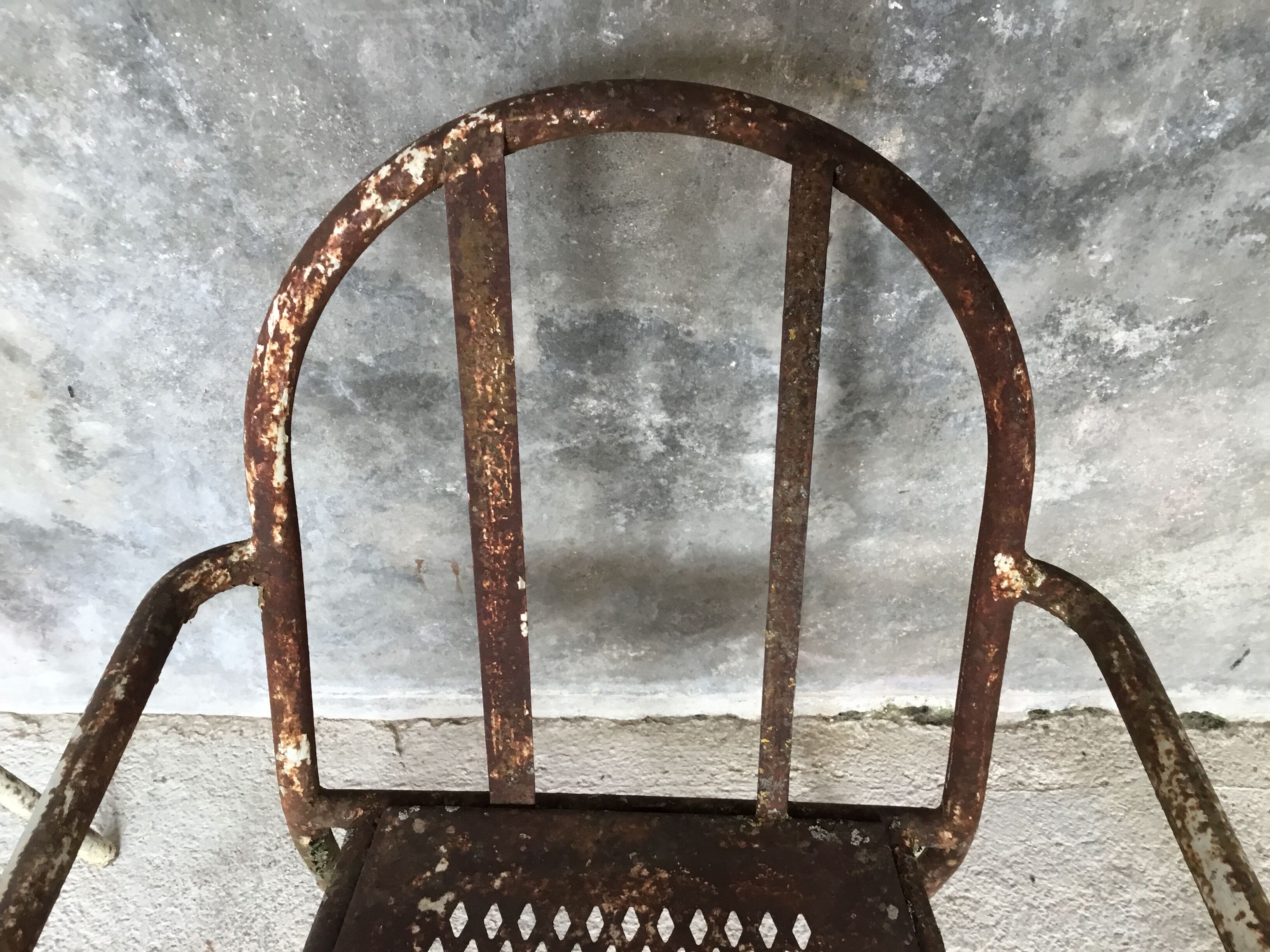 Pair of metal armchairs