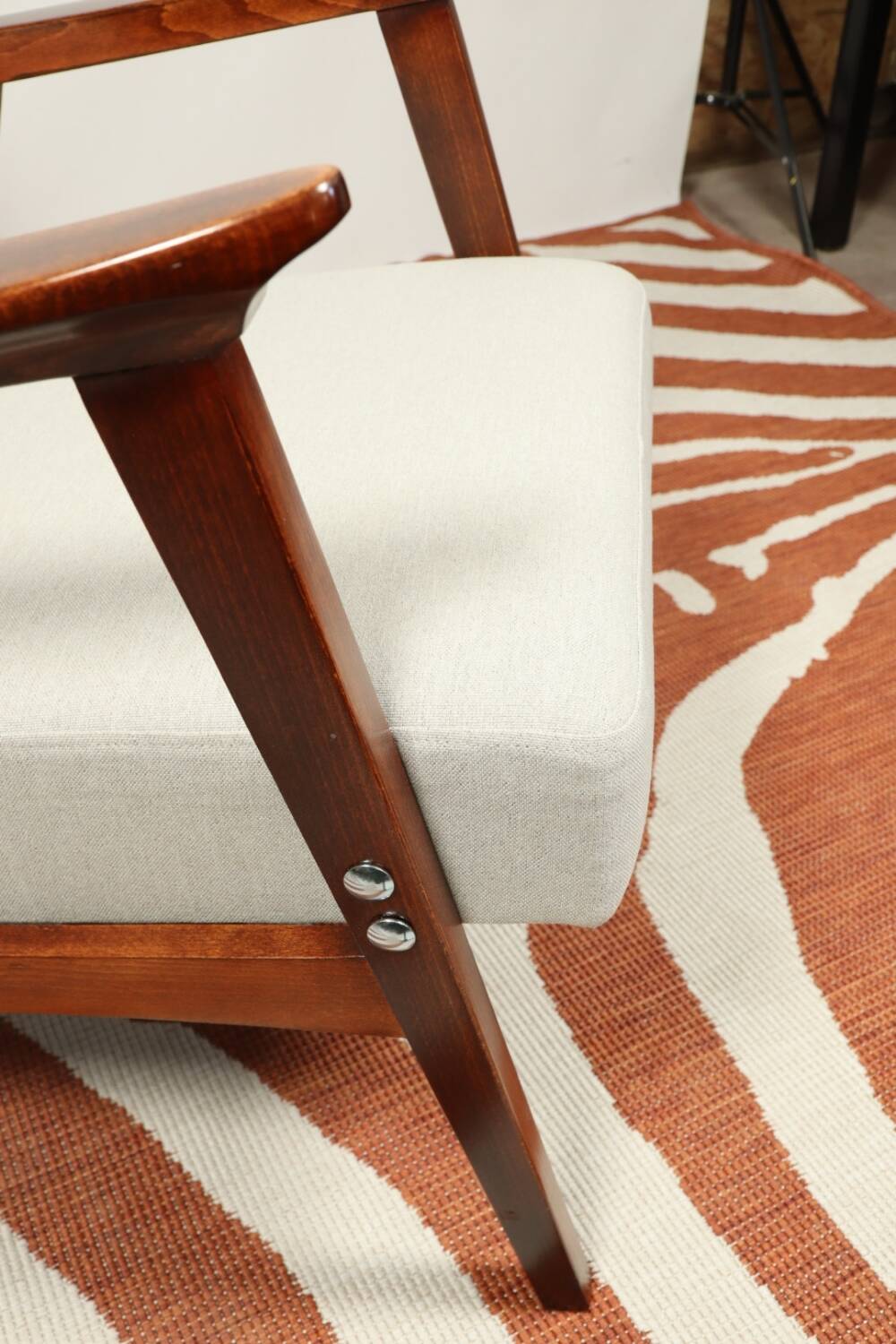 Vintage light gray armchair dark wood Scandinavian design 1970
