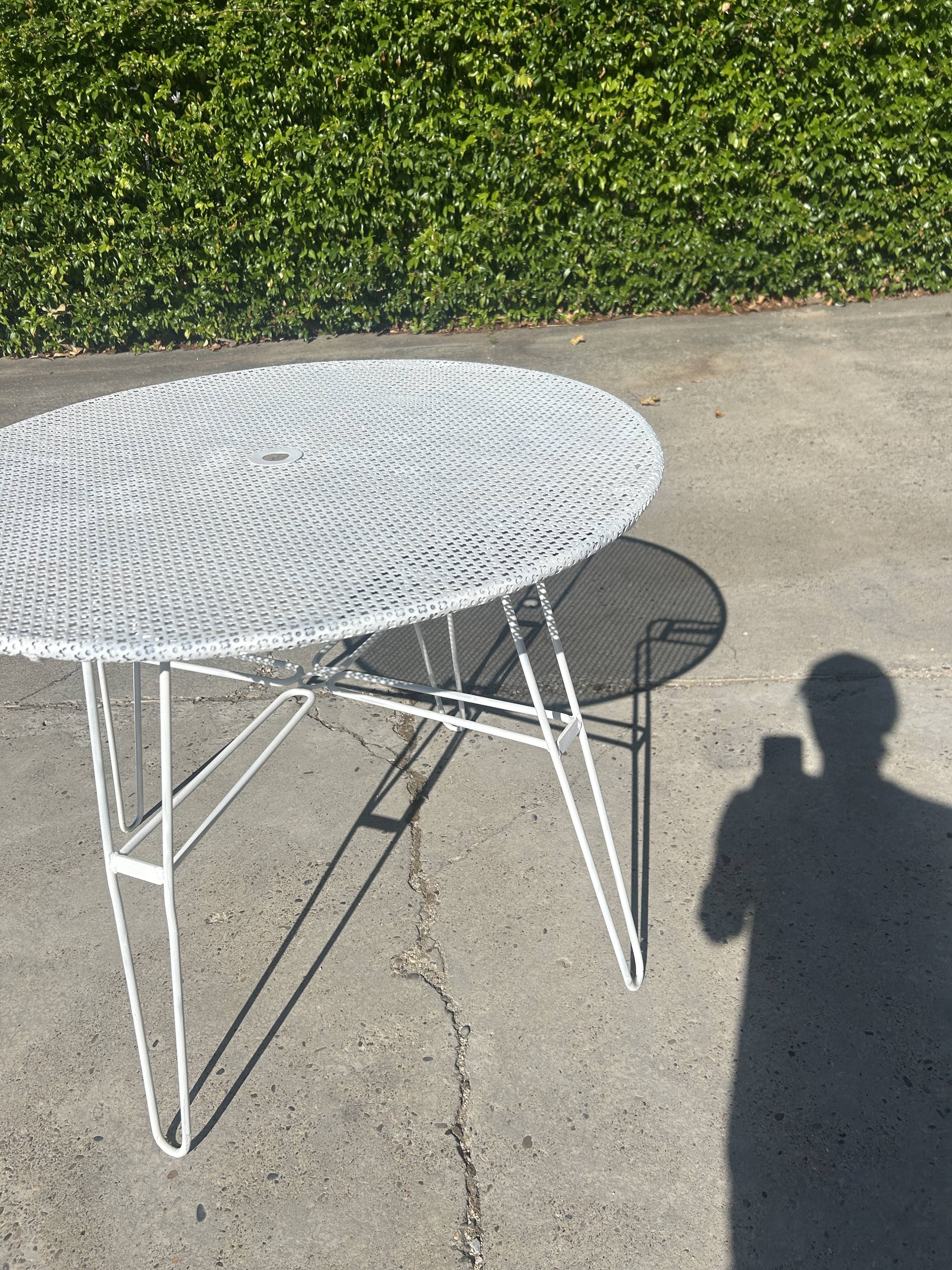 Garden table attributed to Mathieu Mategot from the 1950s.