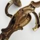 Antique double wall sconce in bronze, acanthus leaf design.