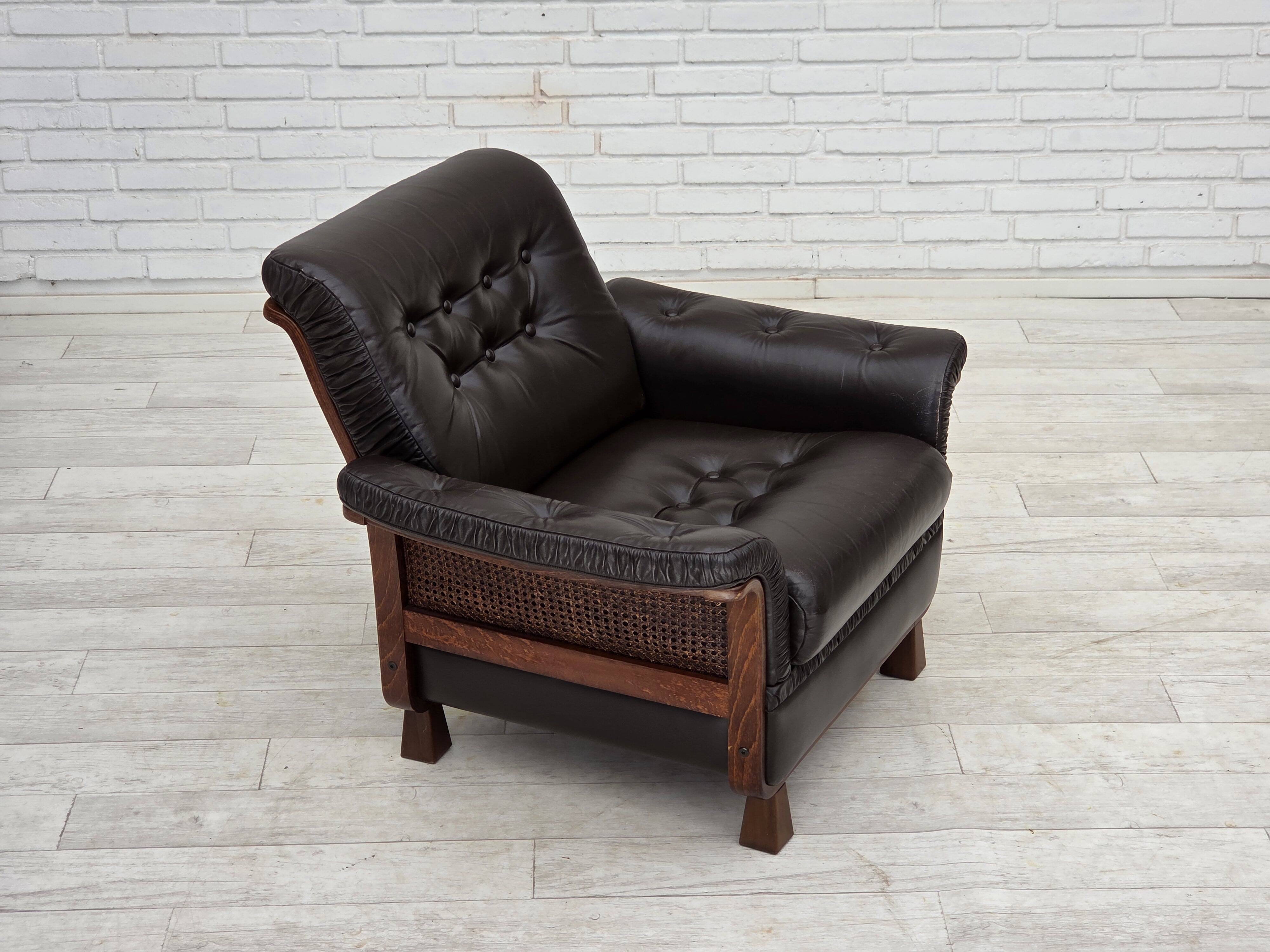 1970s, Scandinavian armchair, brown furniture leather, teak wood legs.