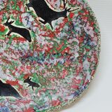 Assiette décorative en céramique émaillée plâtre  décor chasse préhistorique