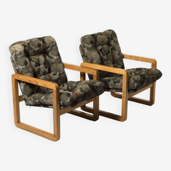 A pair of 'Bolek' chairs, pine wood and funky fabric, Poland, 1980s