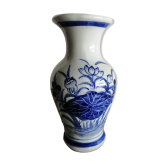 Ancient Asian porcelain vase