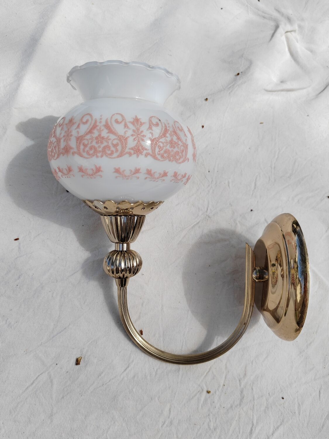 Pair of wall sconces with floral lampshades