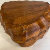 Carved wooden pocket emptier