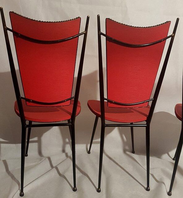 Série de 4 chaises 1950 skaï rouge pieds métal compas