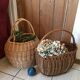 Round basket Wicker braided with two handles.
