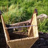 Logs holder in rush and wooden handle