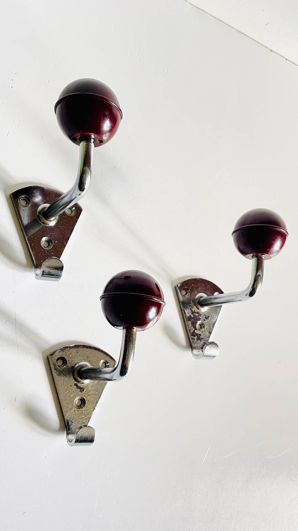 Chrome and bakelite coat hooks from the 70s