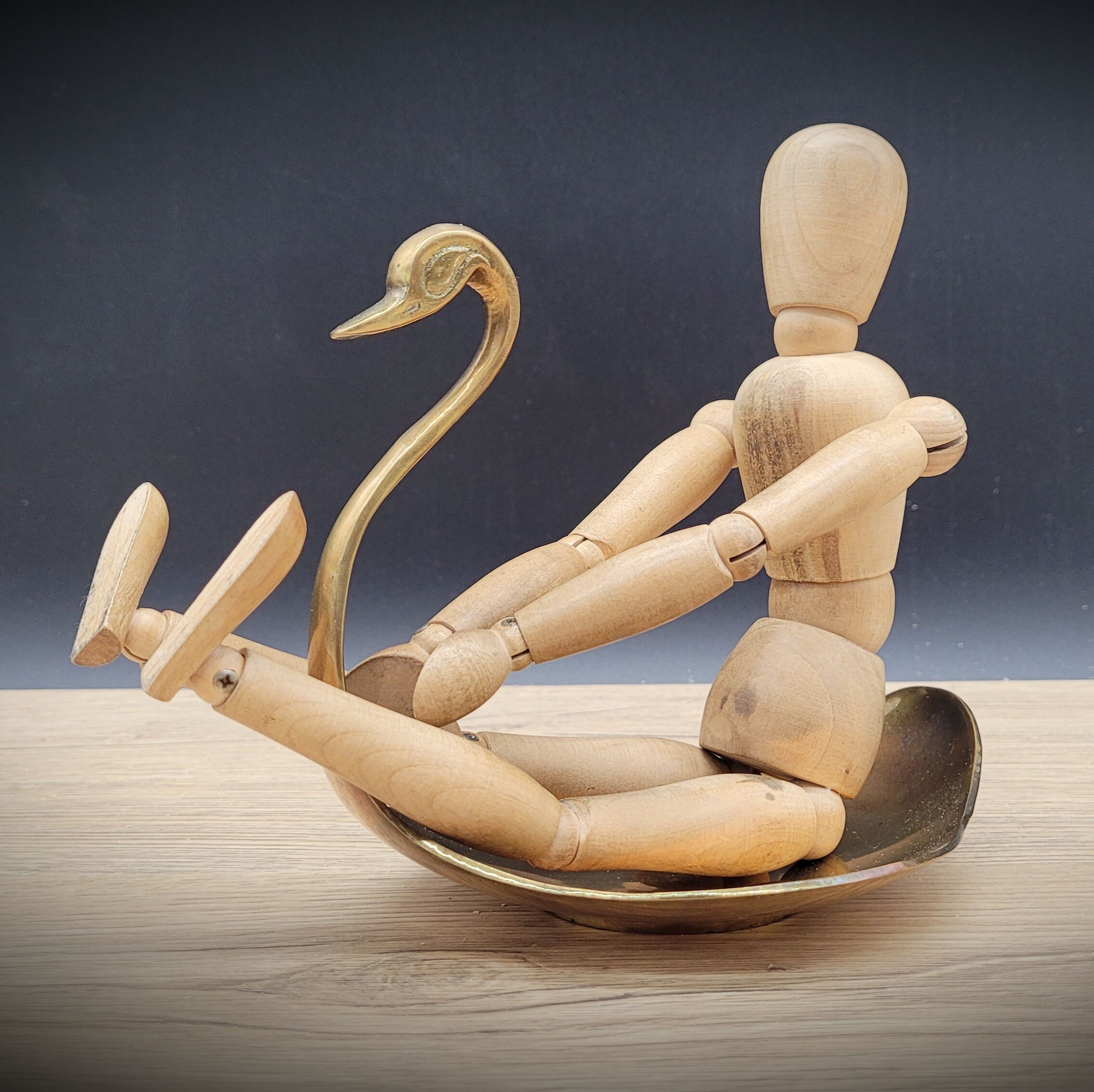 Empty swan brass pocket