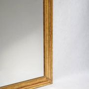 Miroir Louis-Philippe du XIXe siècle avec vase et couronne de fleurs