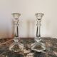 Pair of antique candle holders in transparent glass