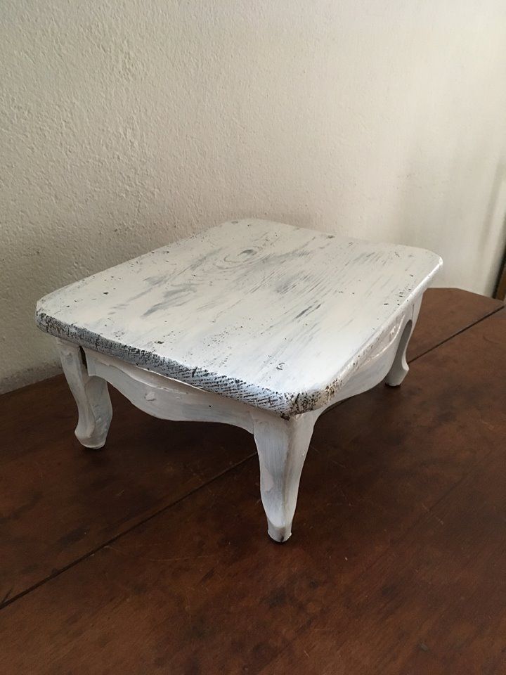 Former foot, skated in white wooden rest
