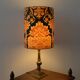 Fabric lampshade with baroque pattern, antique gold leaf design.
