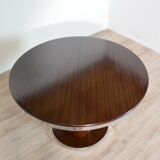 Round dining table with 1970s Italian design extension