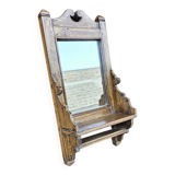 Antique barber's mirror in Burmese teak.