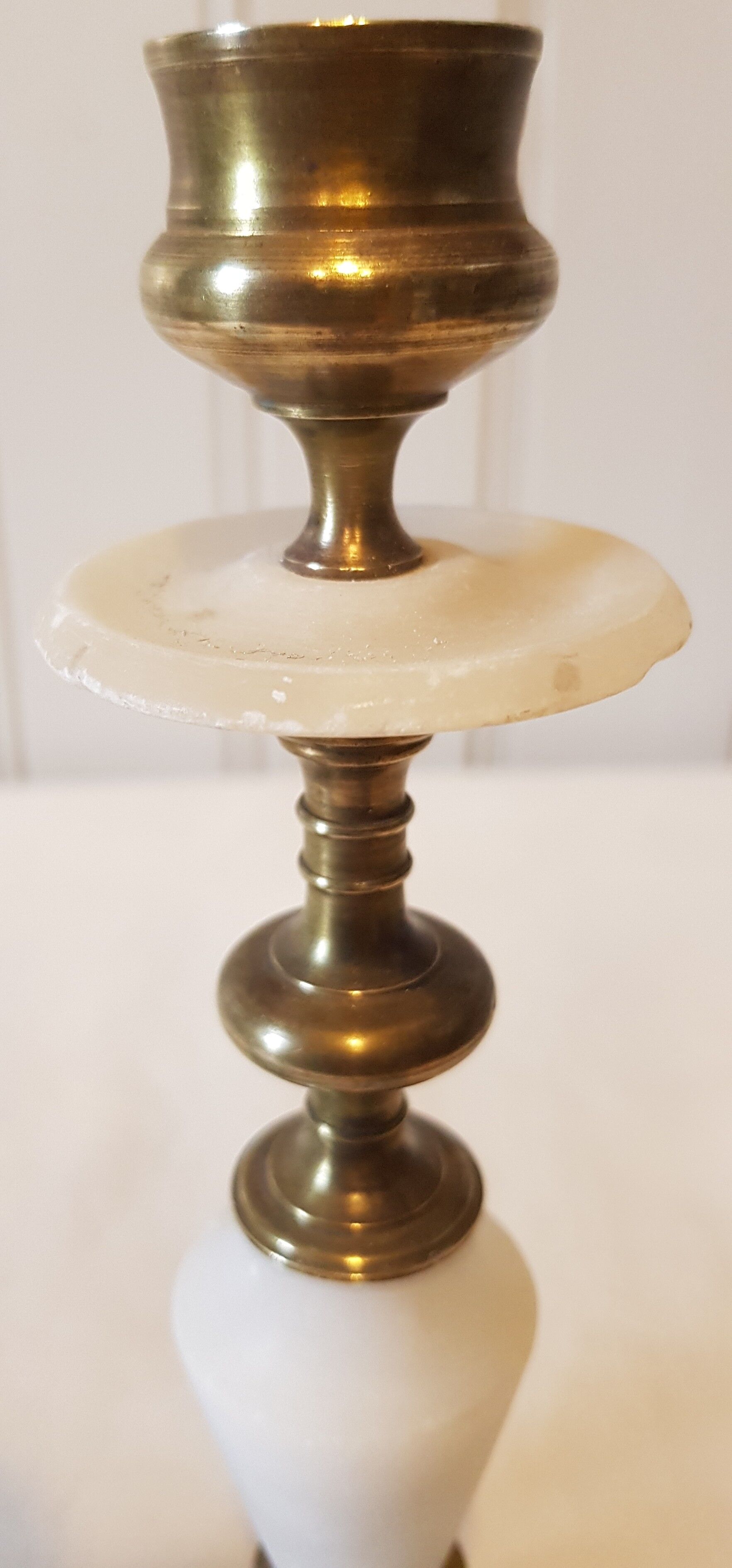 Pair of brass and alabaster candlesticks