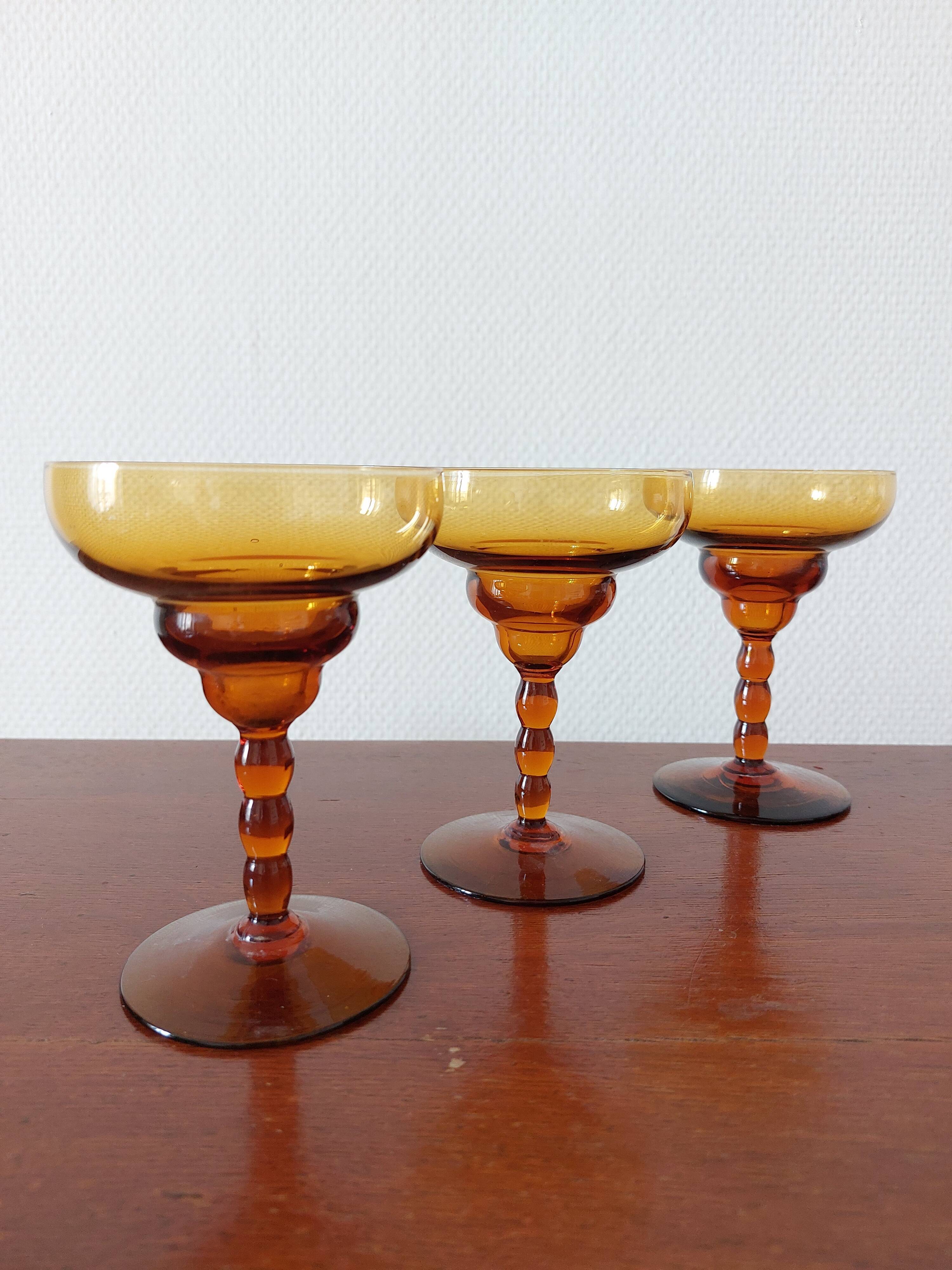 Set of 3 vintage amber foot glasses