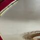 Red and gold felt mirror