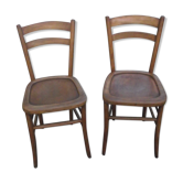 A pair of Lutherma bistro chairs
