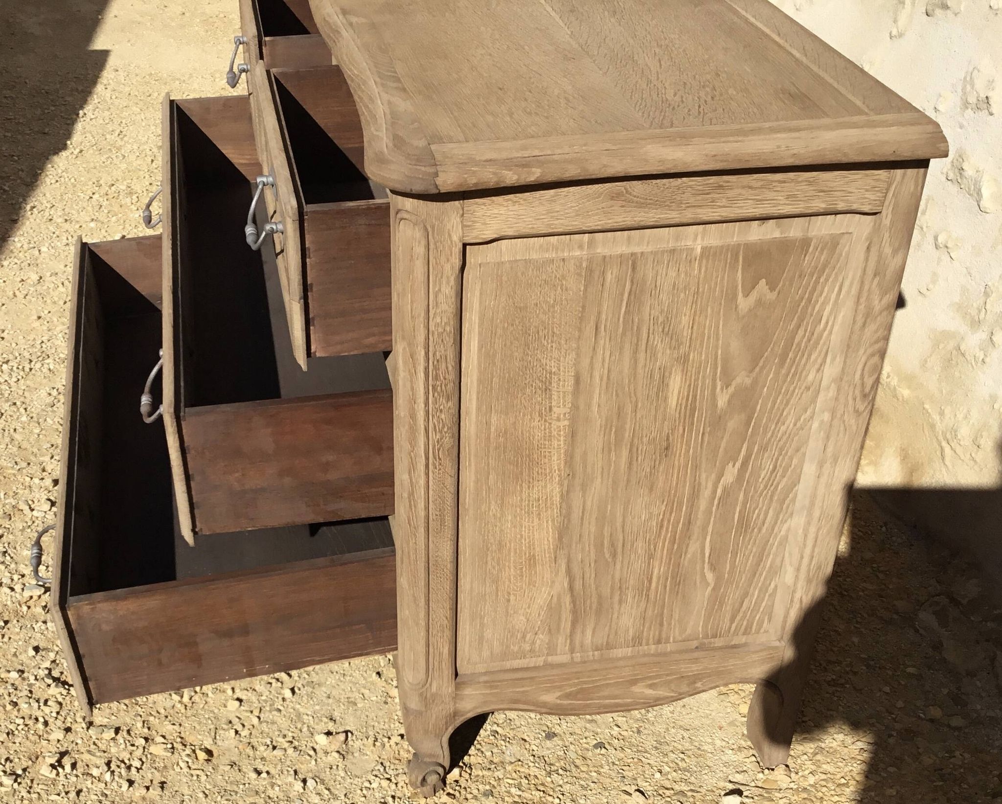 Louis XV style chest of drawers in stripped oak and left in natural wood
