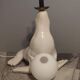 White ceramic sea lion lamp and opaline globe