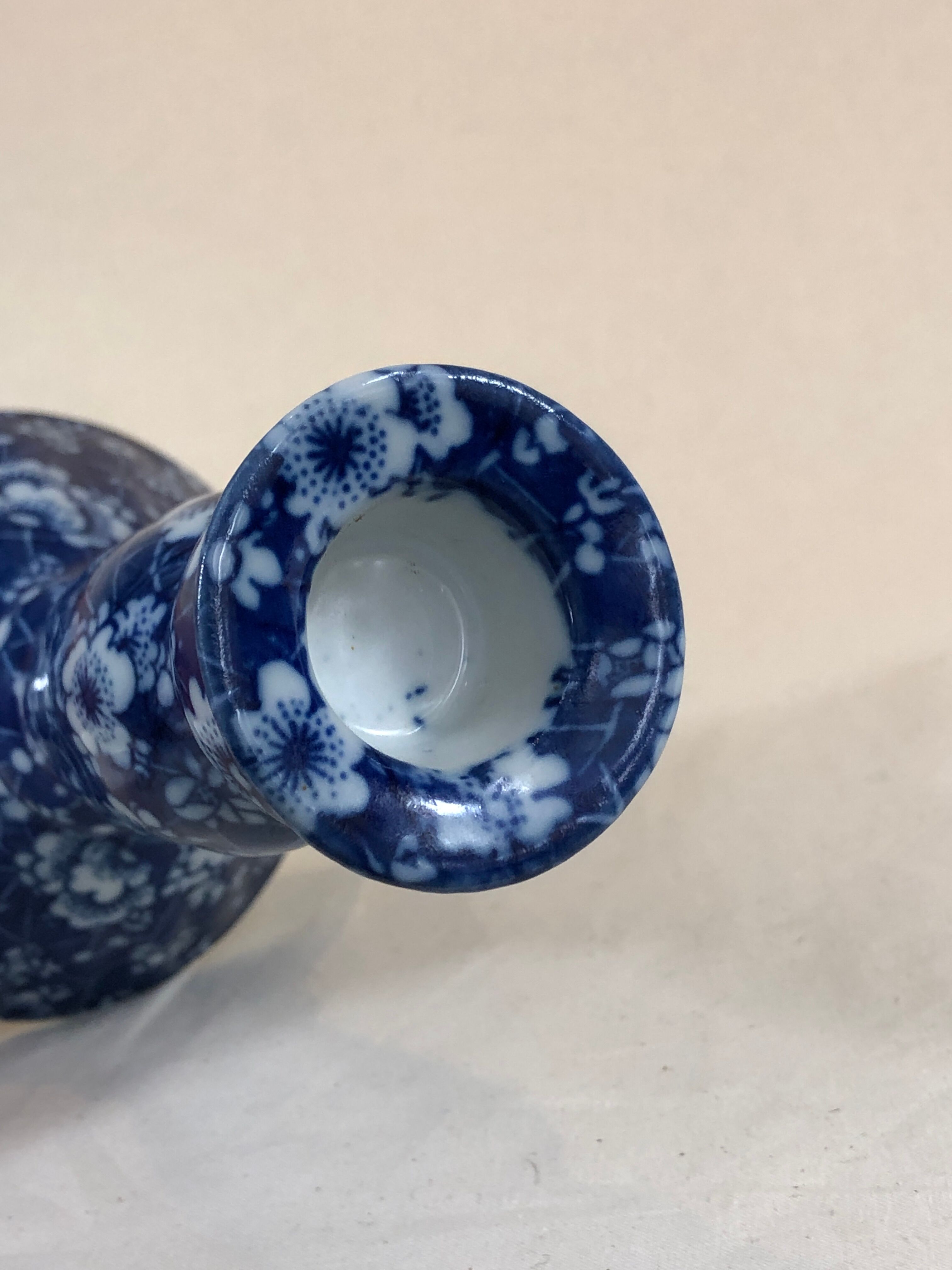 Blue ceramic candle holder pattern small white flowers