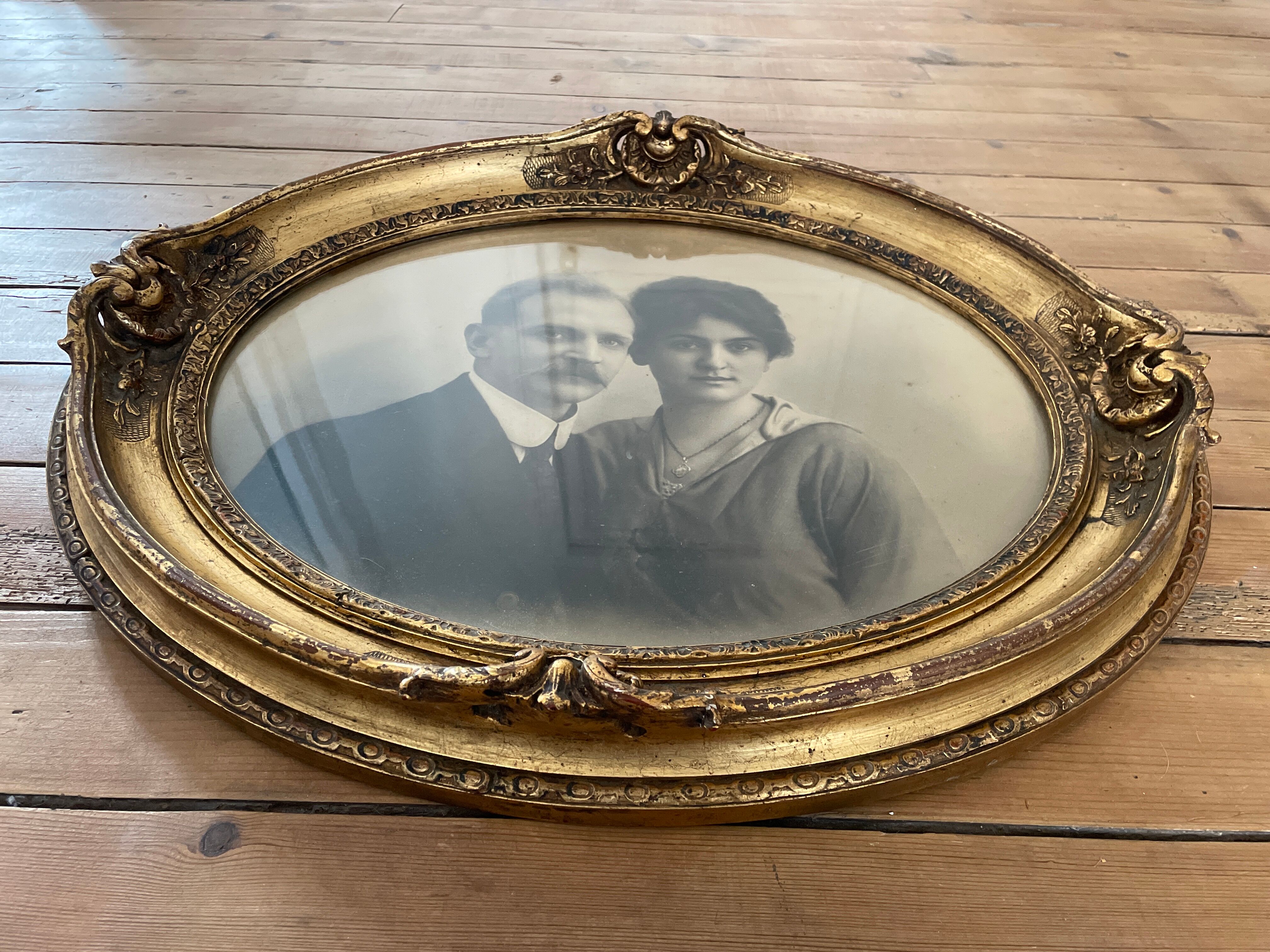 Oval frame portrait of a 19th century couple