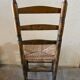 Old turned and stuffed wooden chair