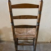 Old turned and stuffed wooden chair