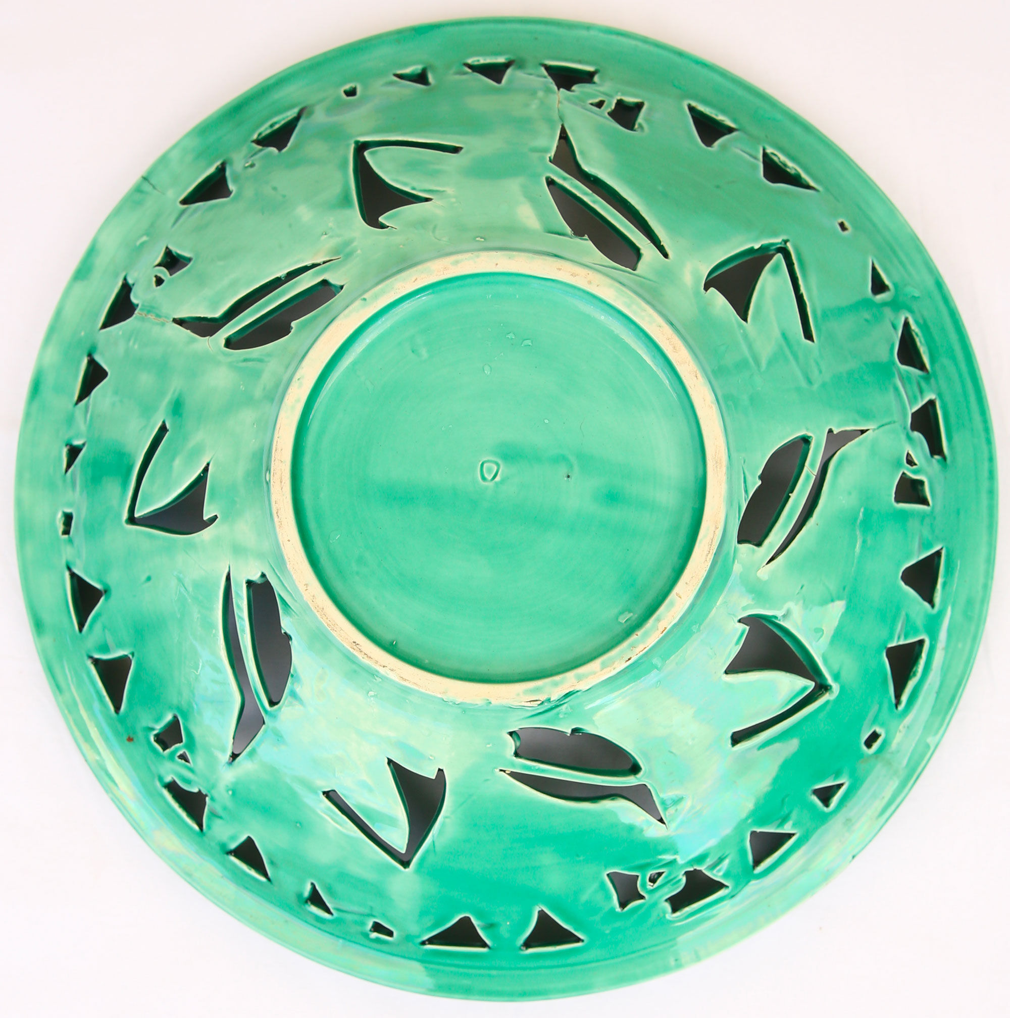 Openwork XL dish in green slurry like olive branches