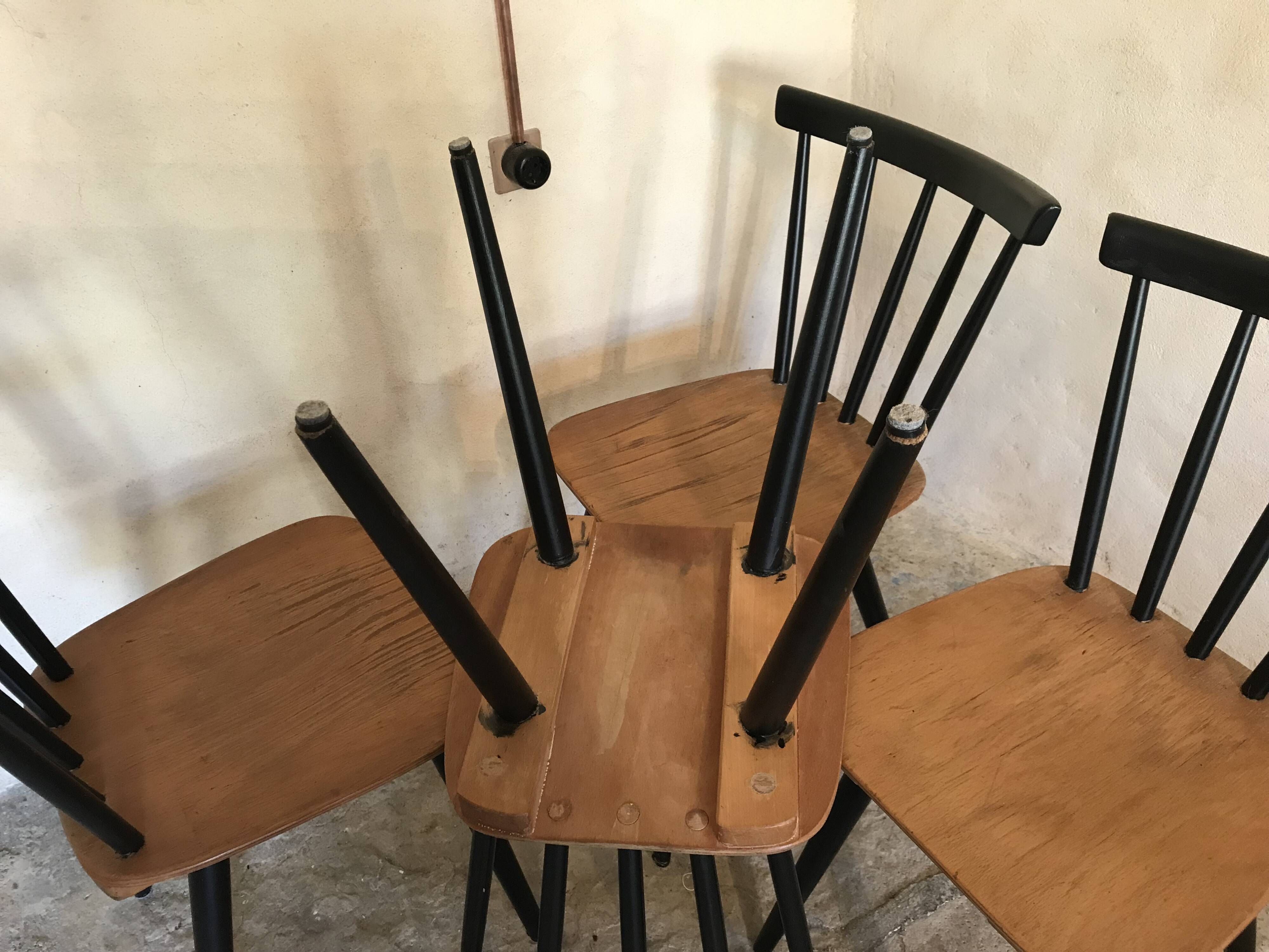 Set of 4 vintage 1960's chairs with bars and black compass legs