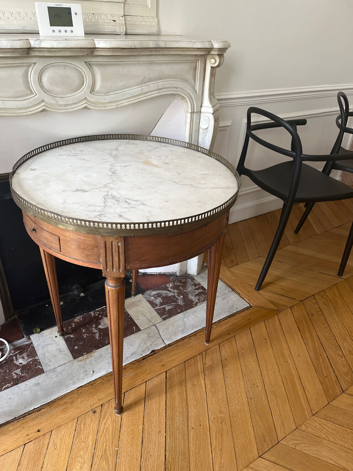 Bouillotte table with marble top in Louis XVI style.