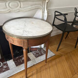 Bouillotte table with marble top in Louis XVI style.