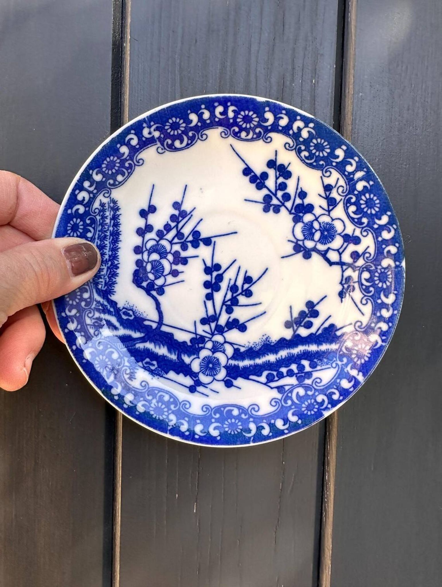 Small vintage plates made in Japan in blue and white porcelain.