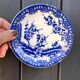 Small vintage plates made in Japan in blue and white porcelain.