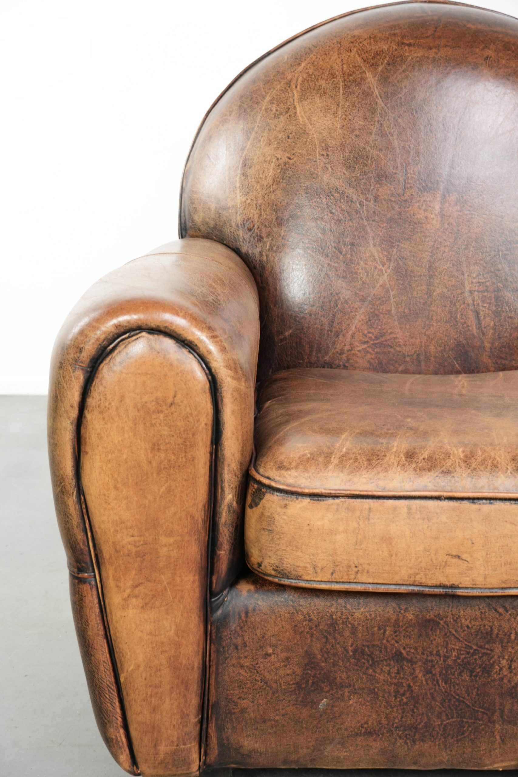 Armchair made of sheepskin leather in Art Deco design with beautiful patina