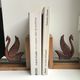 Pair of greenhouse books swans in wood and bakelite 50s