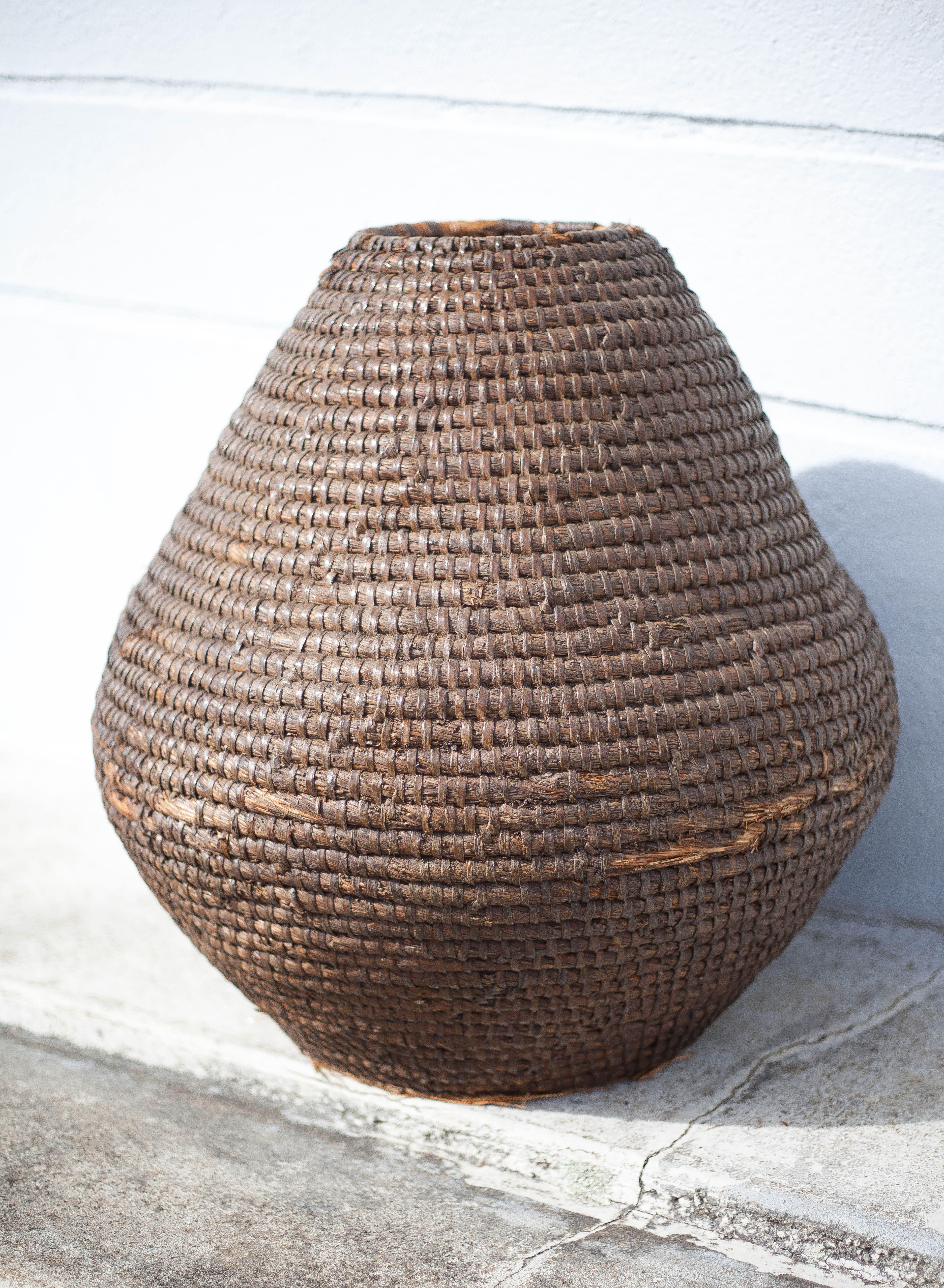 Old basket, straw and bramble bud