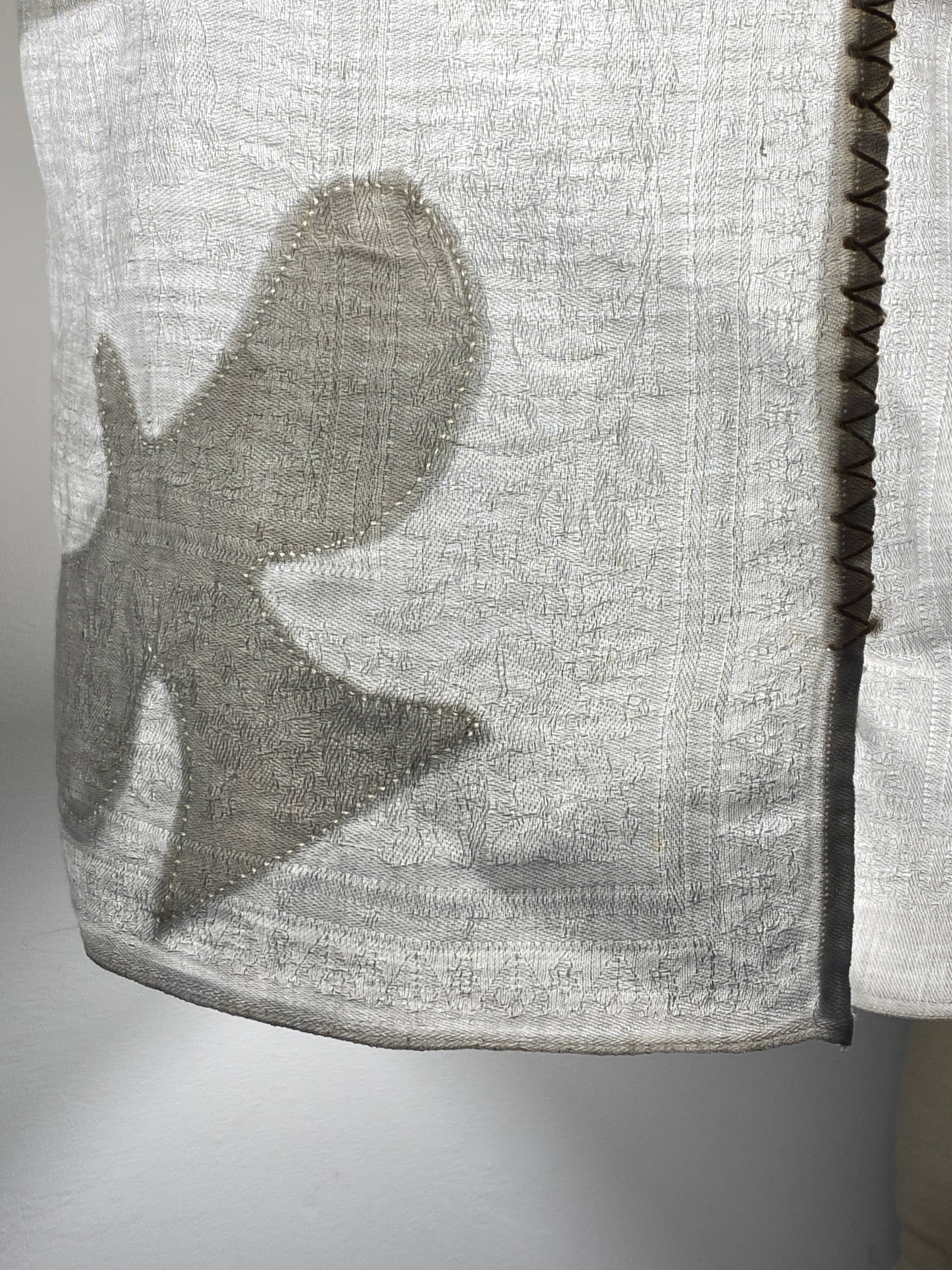 Old linen drapery with monogram and bird by Georges Braque