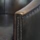 Fauteuil club noir/gris en cuir de mouton