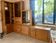 Corner buffet shelf in solid elm desmarchelier