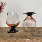 4 pink glasses with black stem