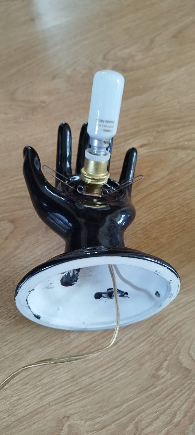 Hand-shaped wall light